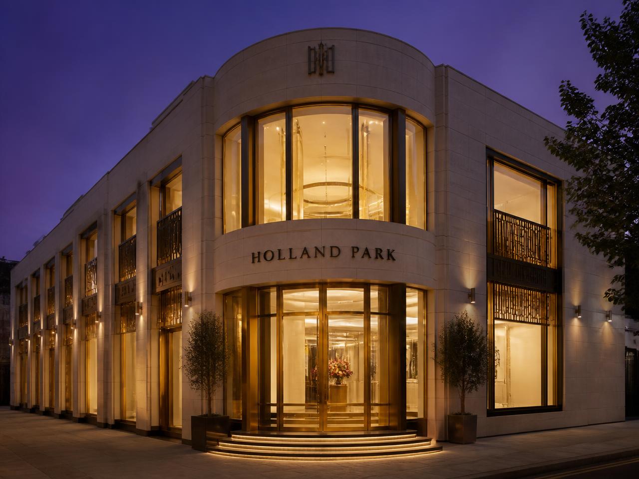 Prestigious commercial property at dusk — the class of assets protected by Atelier Insurance Group